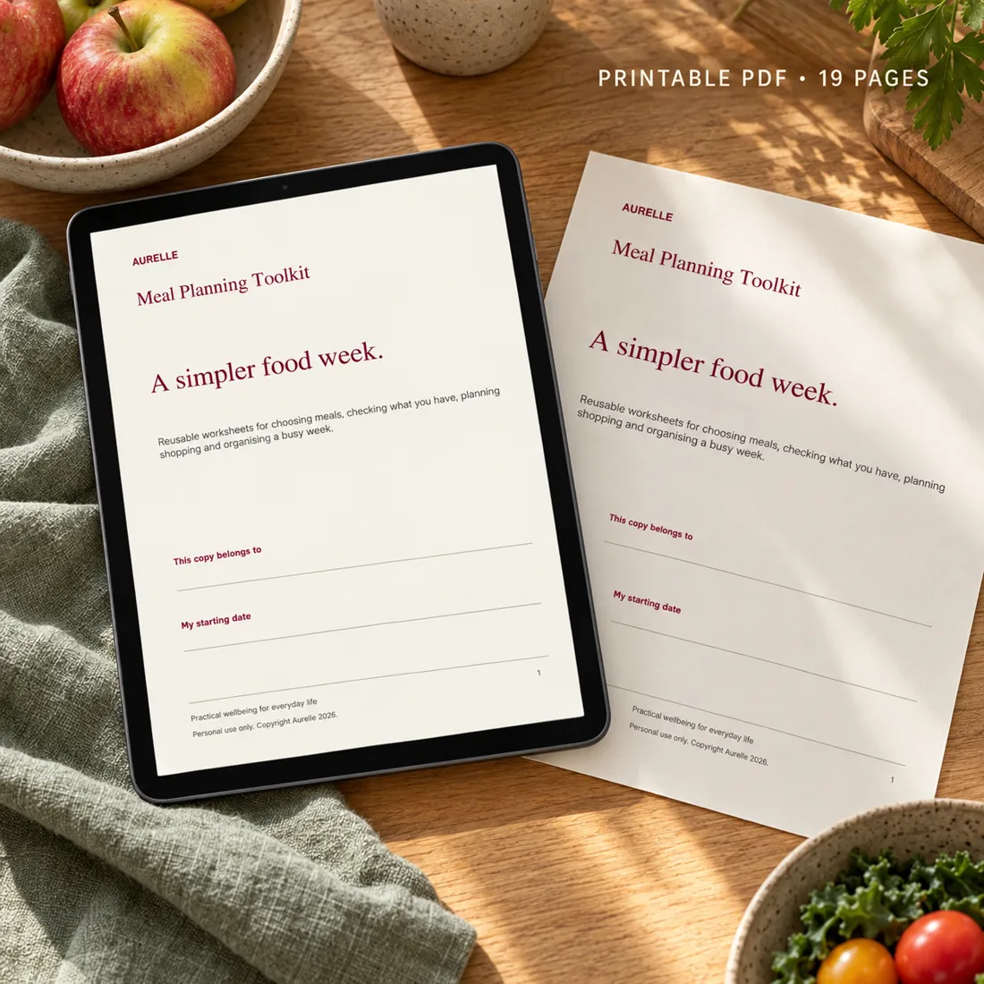 meal planning toolkit PDF displayed on a tablet with a printed cover sheet